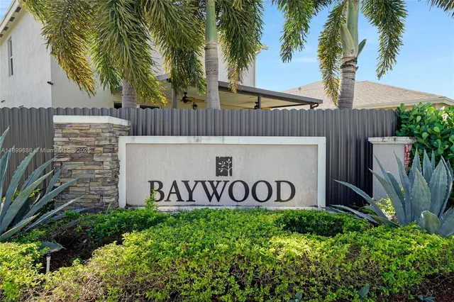 a view of outdoor space with garden and trees