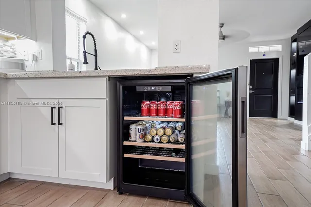 a bed room with a bed and a window