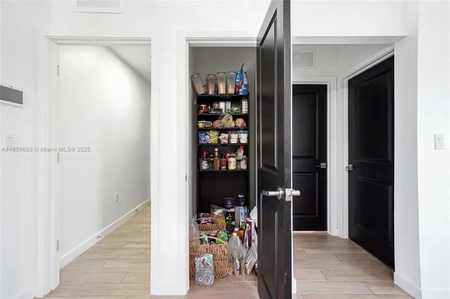 a bed room with furniture and a window