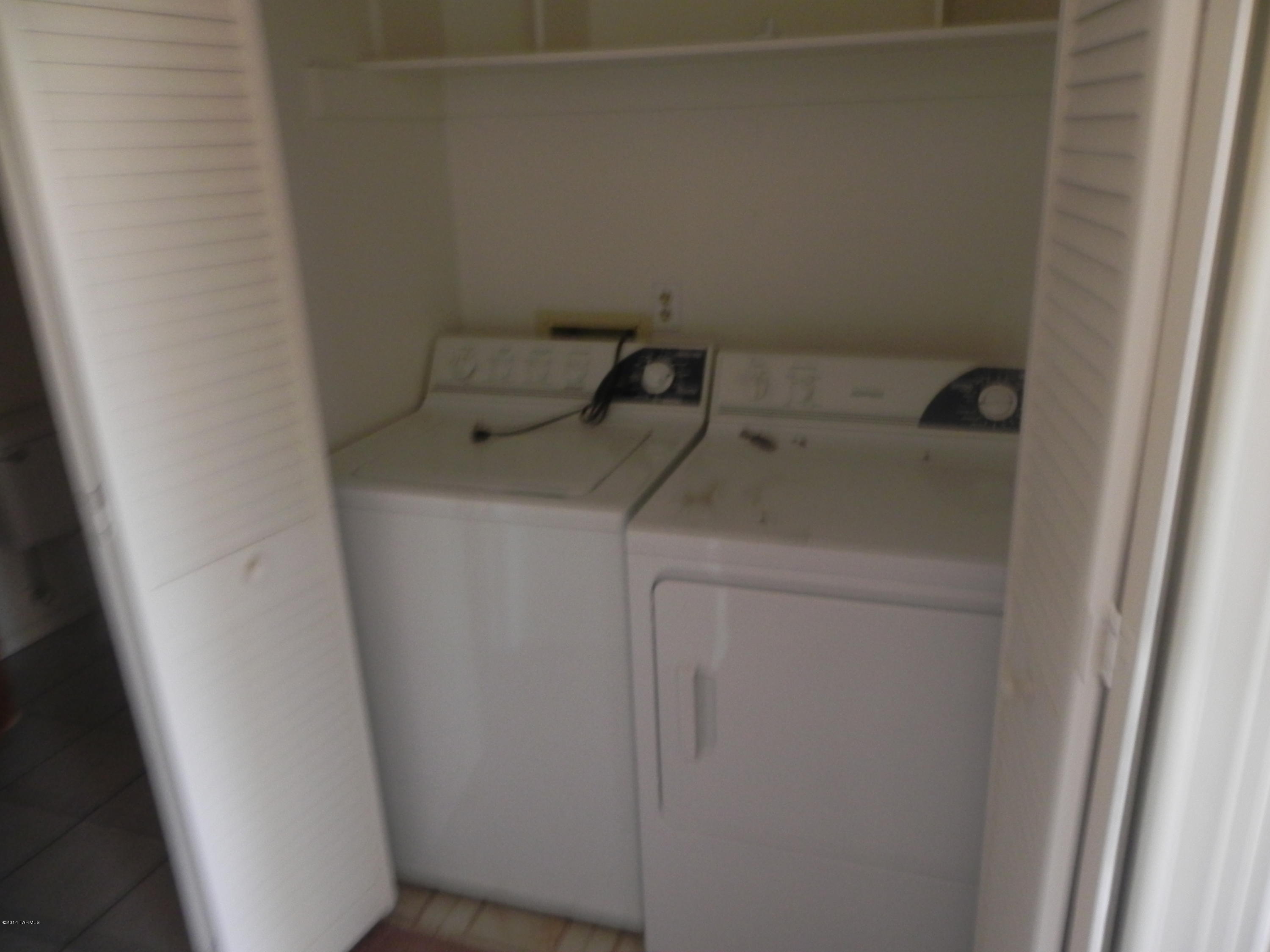 6625 East Golf Links Road, Unit 2 Tucson, AZ 85730 - Photo 11 of 14 a utility room with dryer and washer