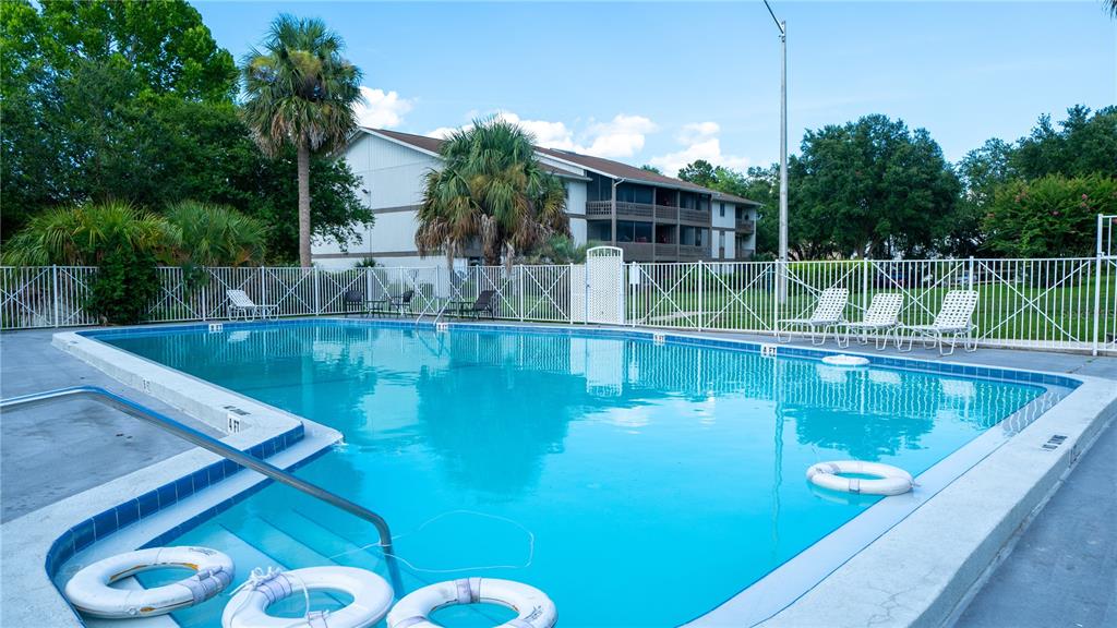 Undisclosed Address Gainesville, FL 32607 - Photo 5 of 21 a view of a swimming pool with a patio