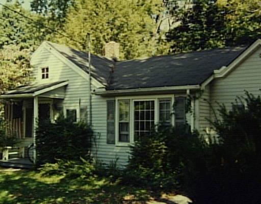 31 Maple Street Kent, CT 06757 - Photo 1 of 1 front view of a house with a garden