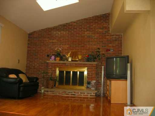 104 Roxy Avenue Edison, NJ 08820 - Photo 5 of 5 a front view of a house with windows