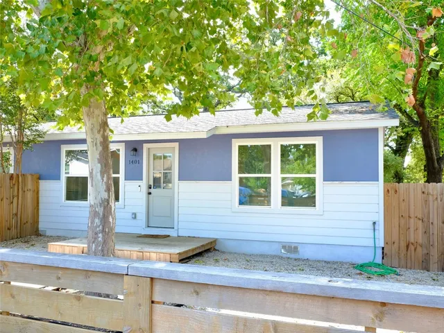 a front view of a house with porch