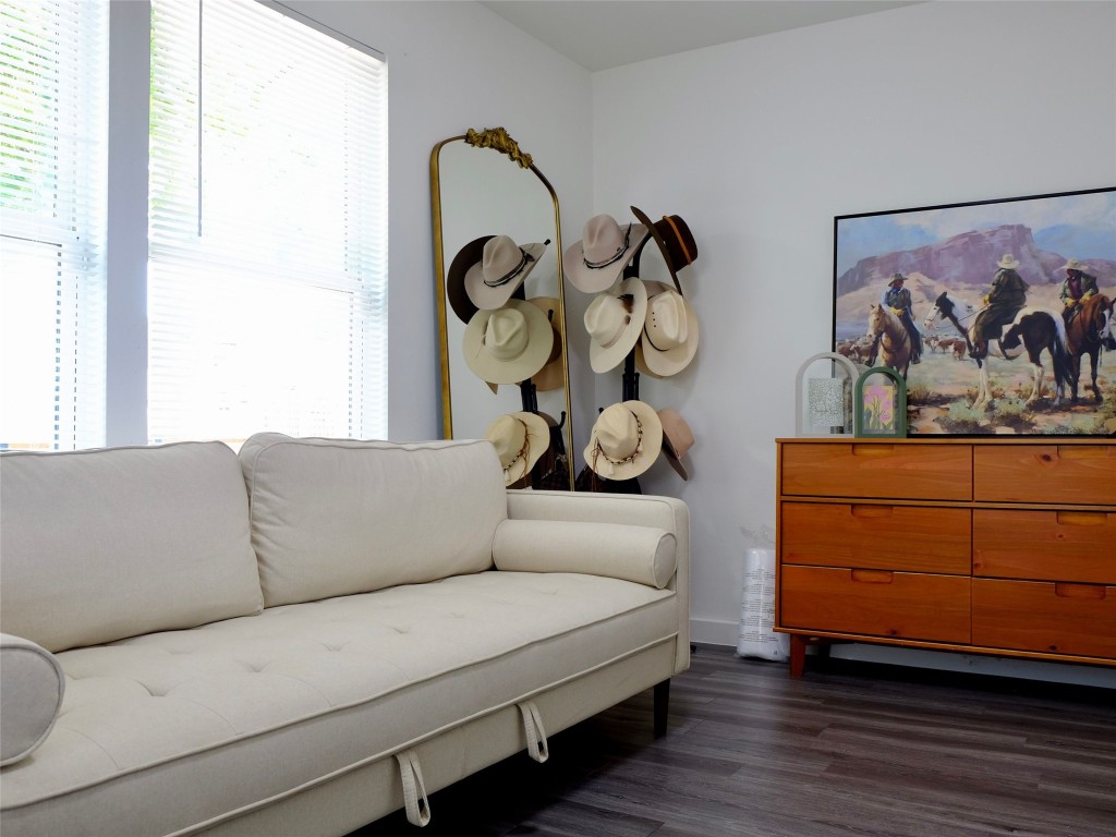1401 Marcus Place, Unit B Austin, TX 78721 - Photo 31 of 38 a living room with furniture and wooden floor