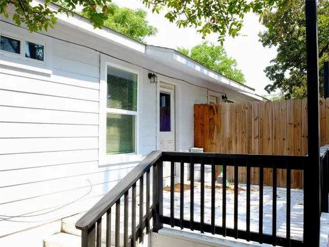 a view of a balcony with window