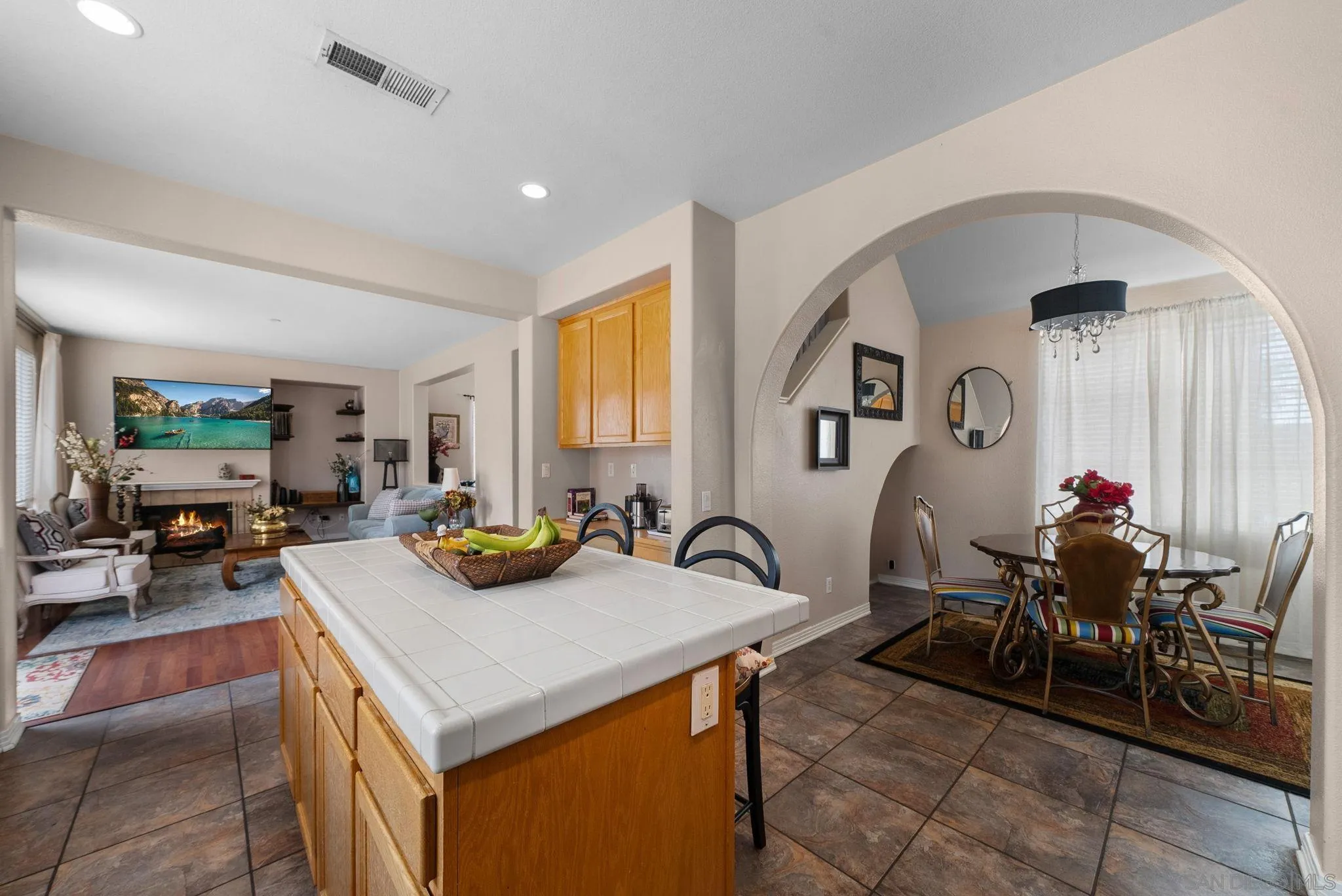 461 Poets Square Fallbrook, CA 92028 - Photo 11 of 40 a view of a dining room with furniture