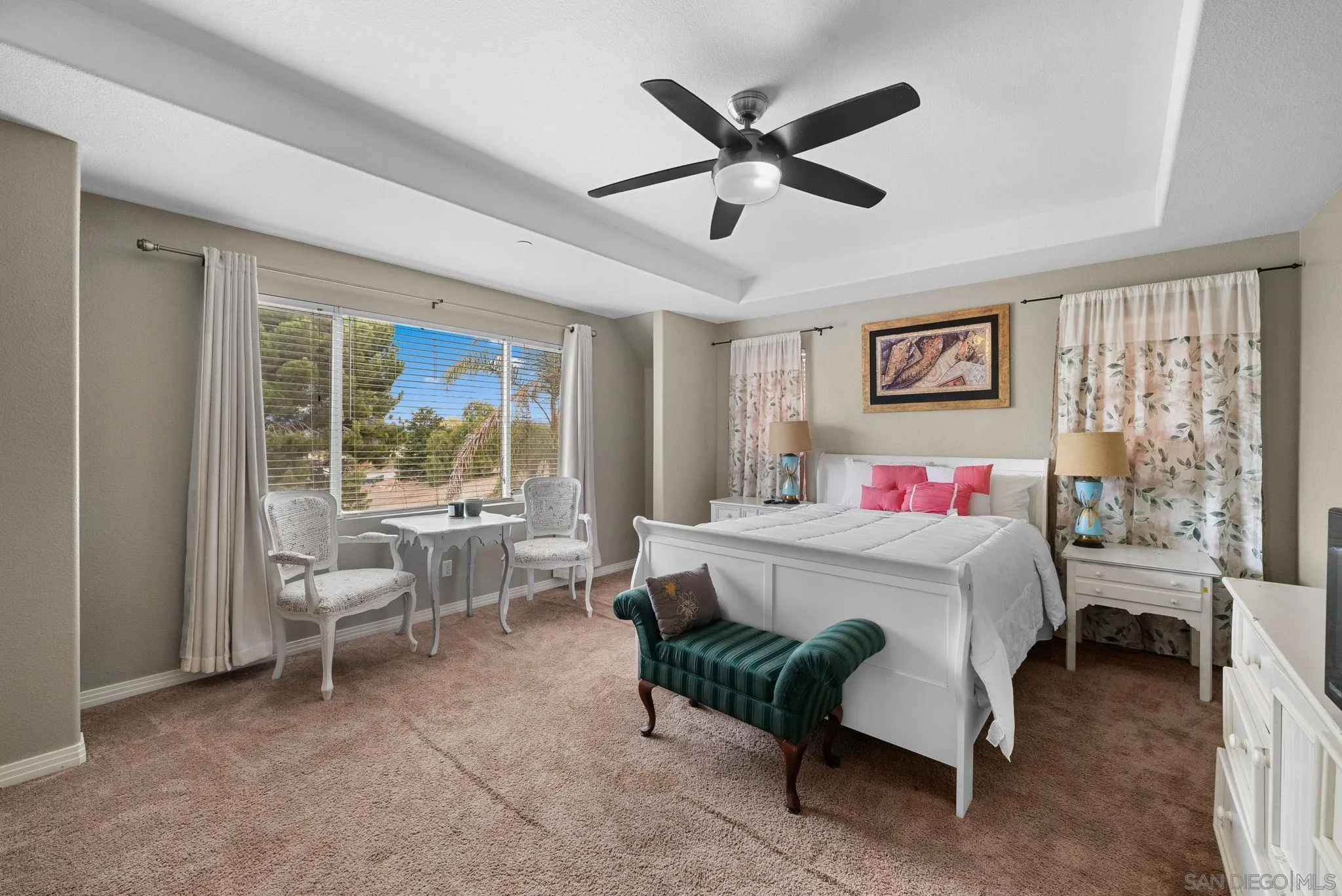 461 Poets Square Fallbrook, CA 92028 - Photo 19 of 40 a bedroom with a bed and a large window