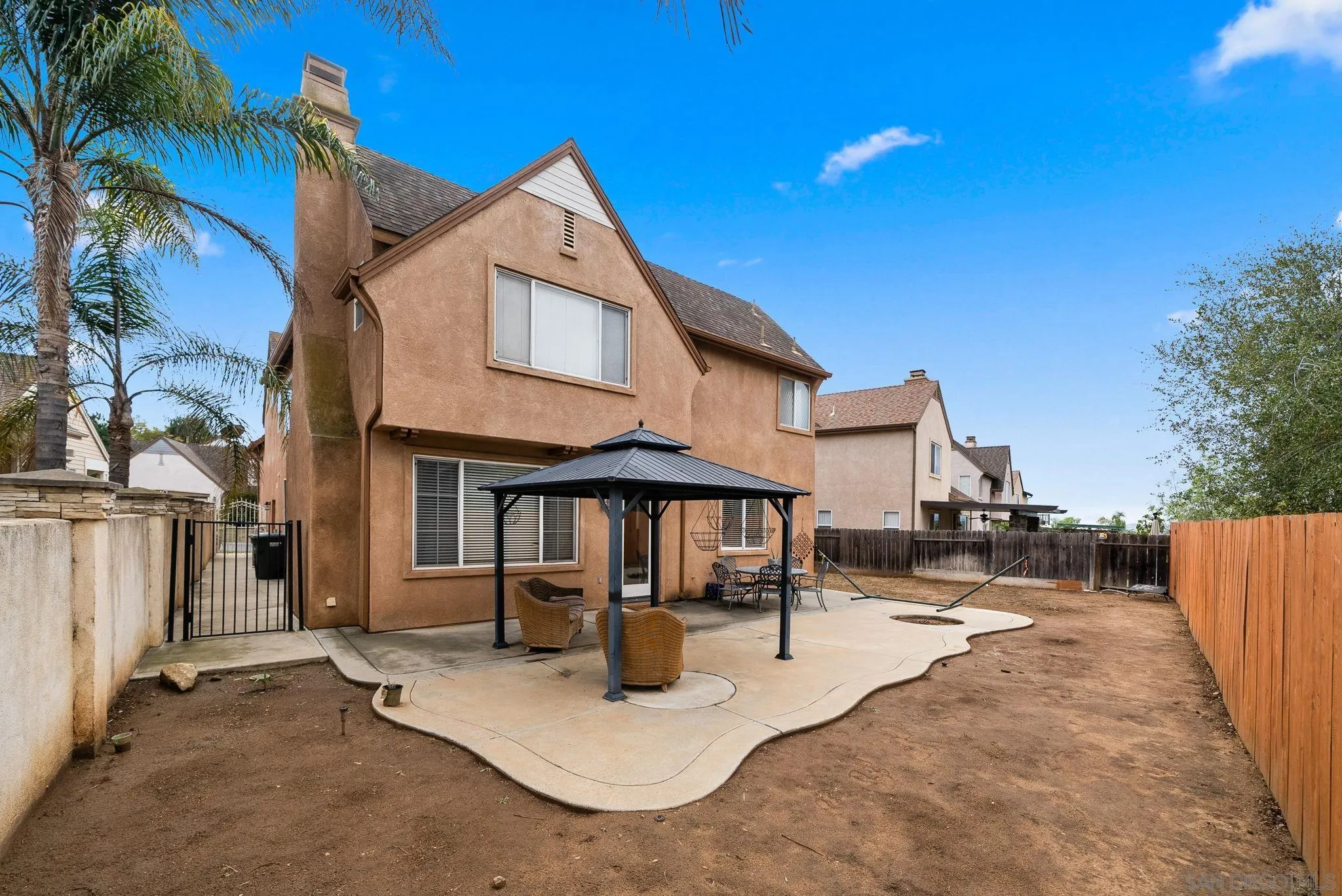 461 Poets Square Fallbrook, CA 92028 - Photo 32 of 40 a view of a house with sitting area