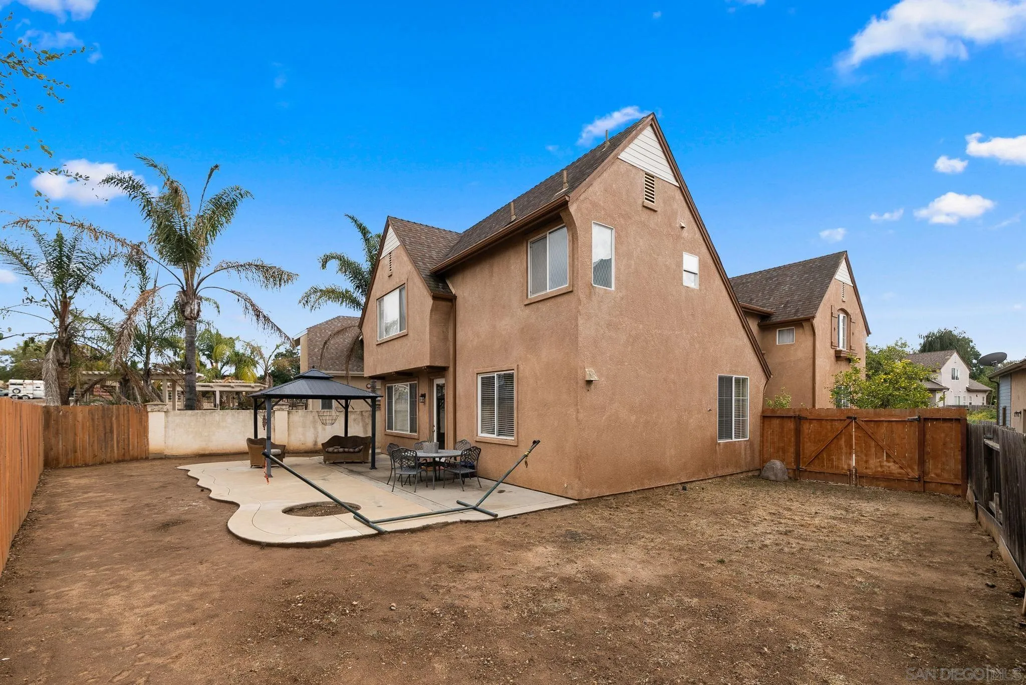 461 Poets Square Fallbrook, CA 92028 - Photo 33 of 40 a view of a house with a patio