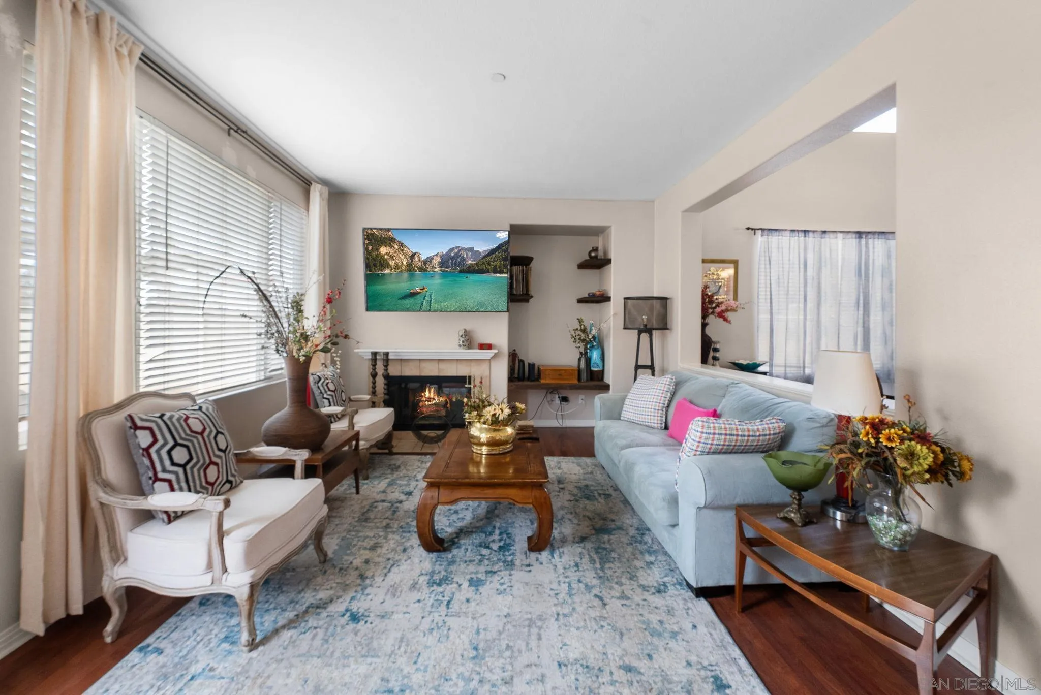 461 Poets Square Fallbrook, CA 92028 - Photo 10 of 40 a living room with furniture and a flat screen tv