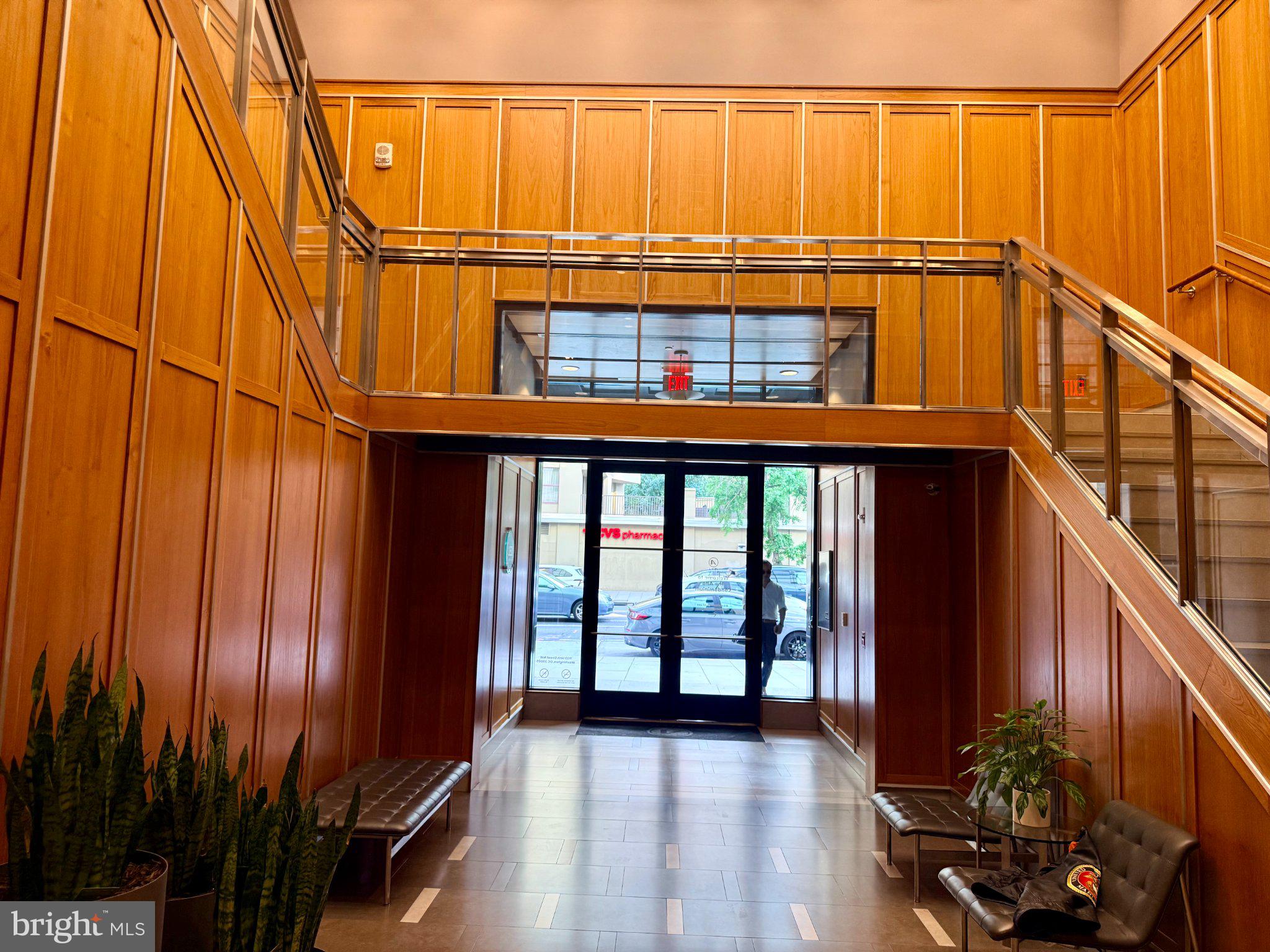 1133 14th Street Northwest, Unit 503 Washington, DC 20005 - Photo 3 of 29 Elegant entryway with wooden accents.