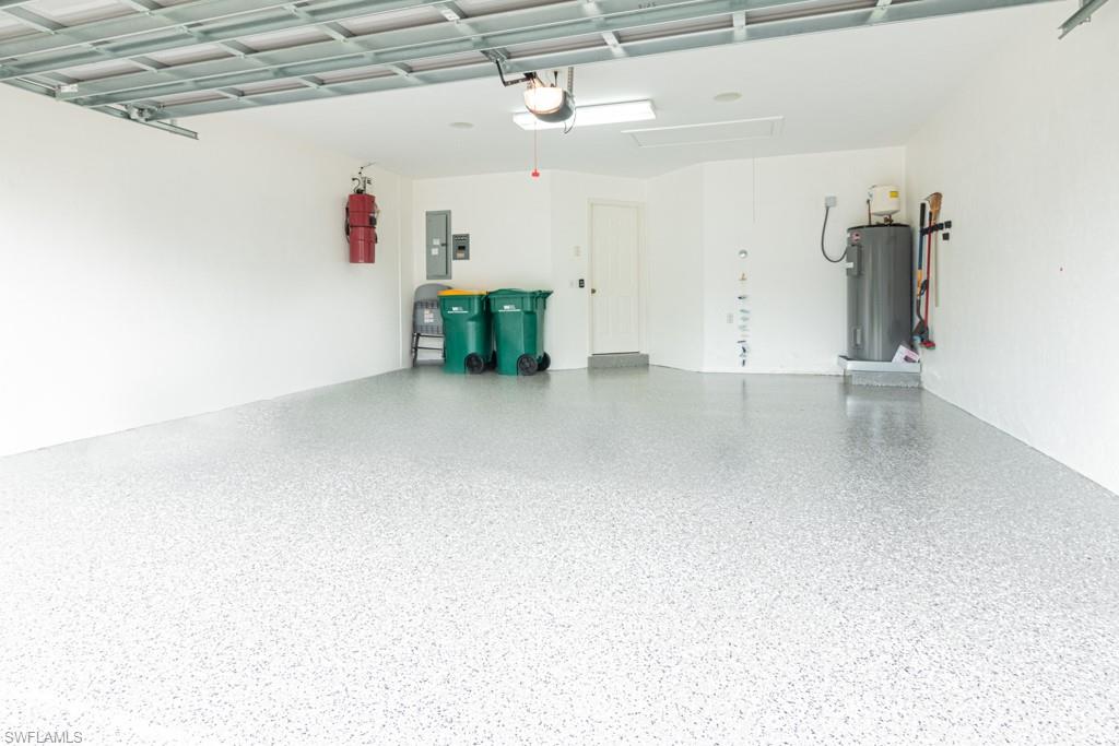 519 Cormorant Cove Naples, FL 34113 - Photo 28 of 32 a view of storage and utility room with a window