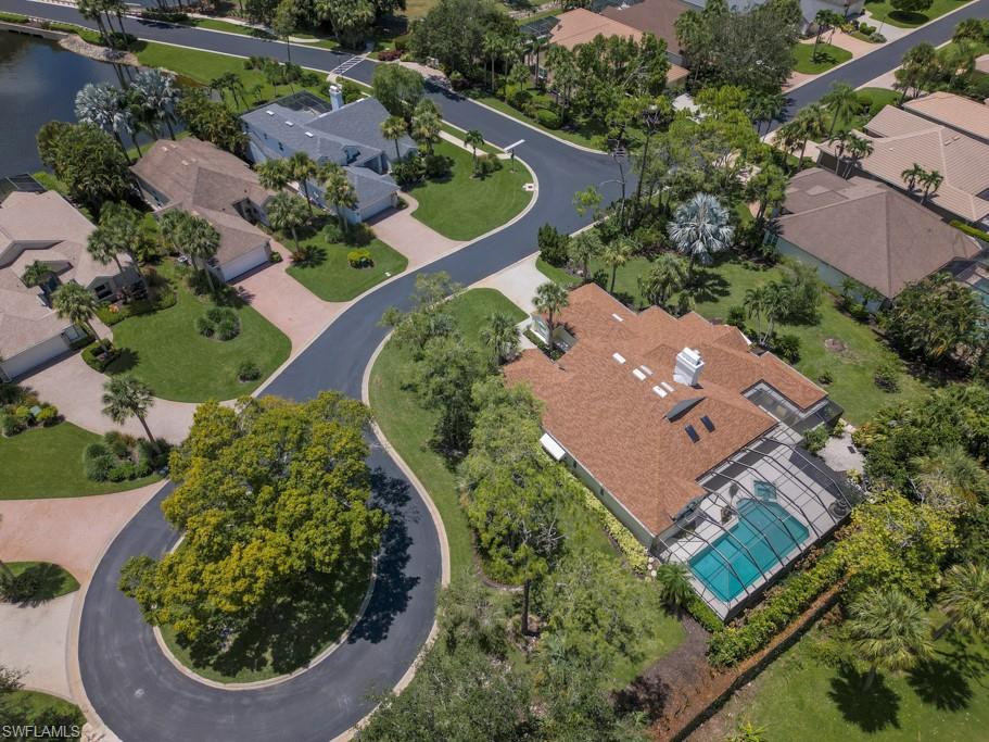 519 Cormorant Cove Naples, FL 34113 - Photo 30 of 32 an aerial view of a house