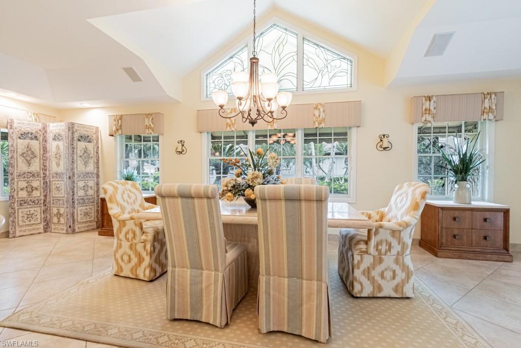 519 Cormorant Cove Naples, FL 34113 - Photo 6 of 32 a view of a dining room with furniture window and outside view