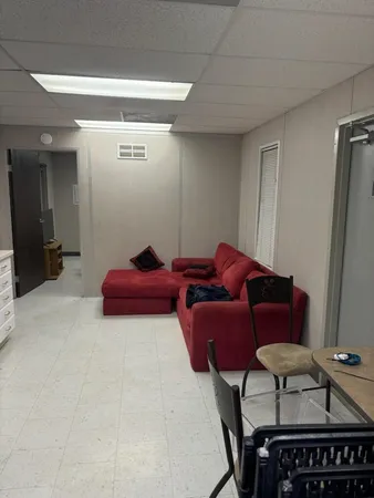 a projector room with furniture