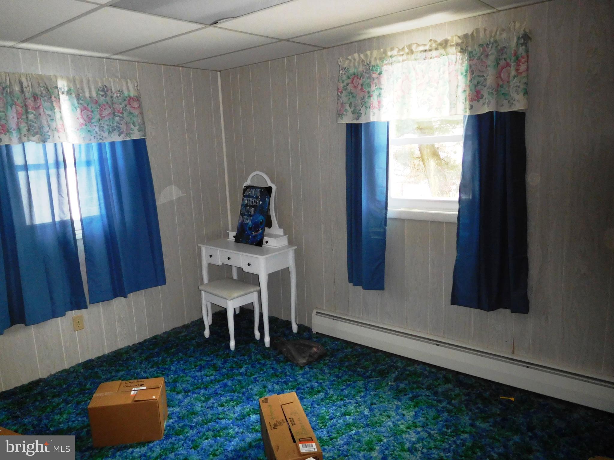 14920 Cemetery Road Midland, MD 21532 - Photo 12 of 26 a living room with furniture and a window