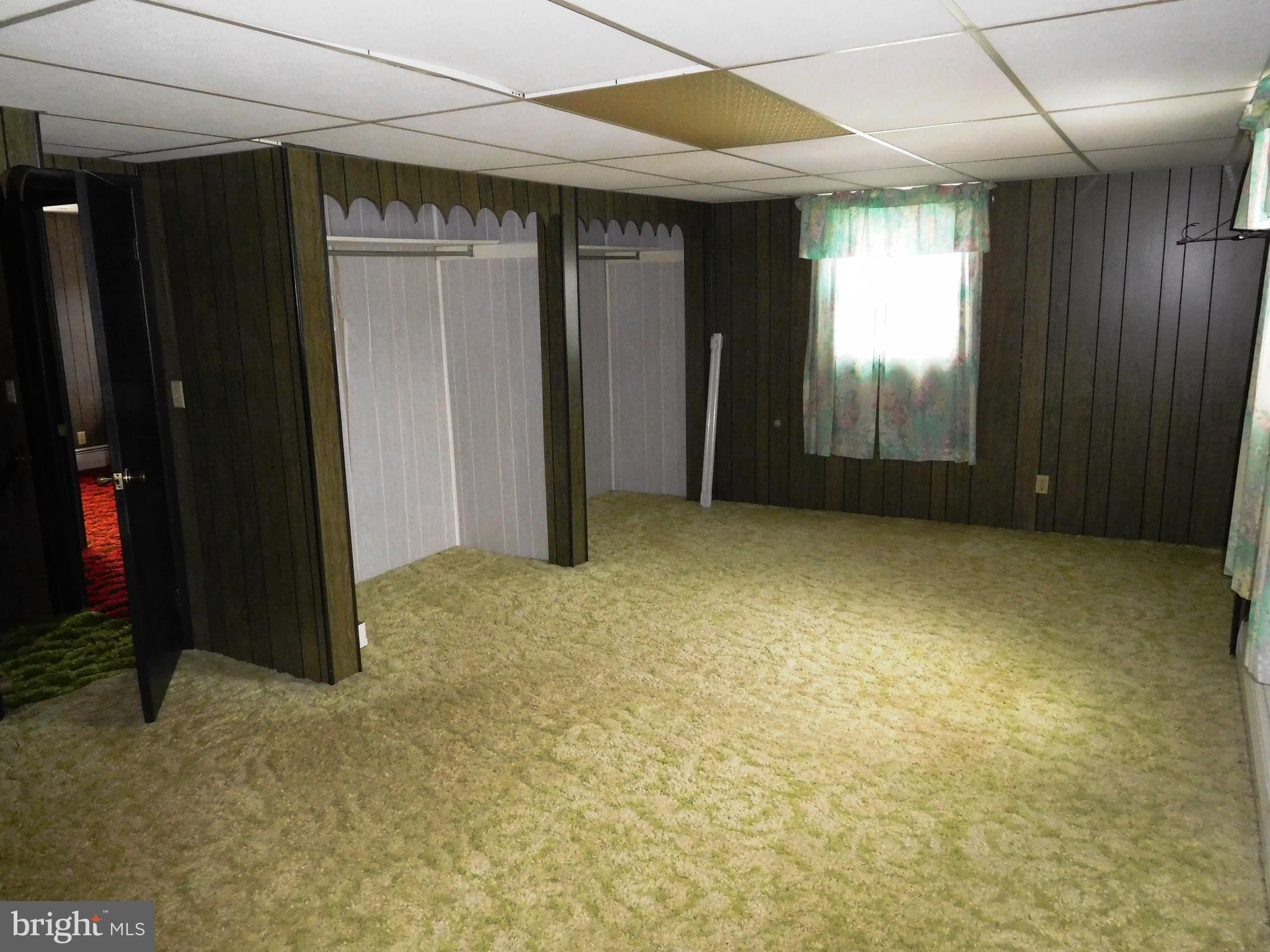 14920 Cemetery Road Midland, MD 21532 - Photo 8 of 26 an empty room with windows