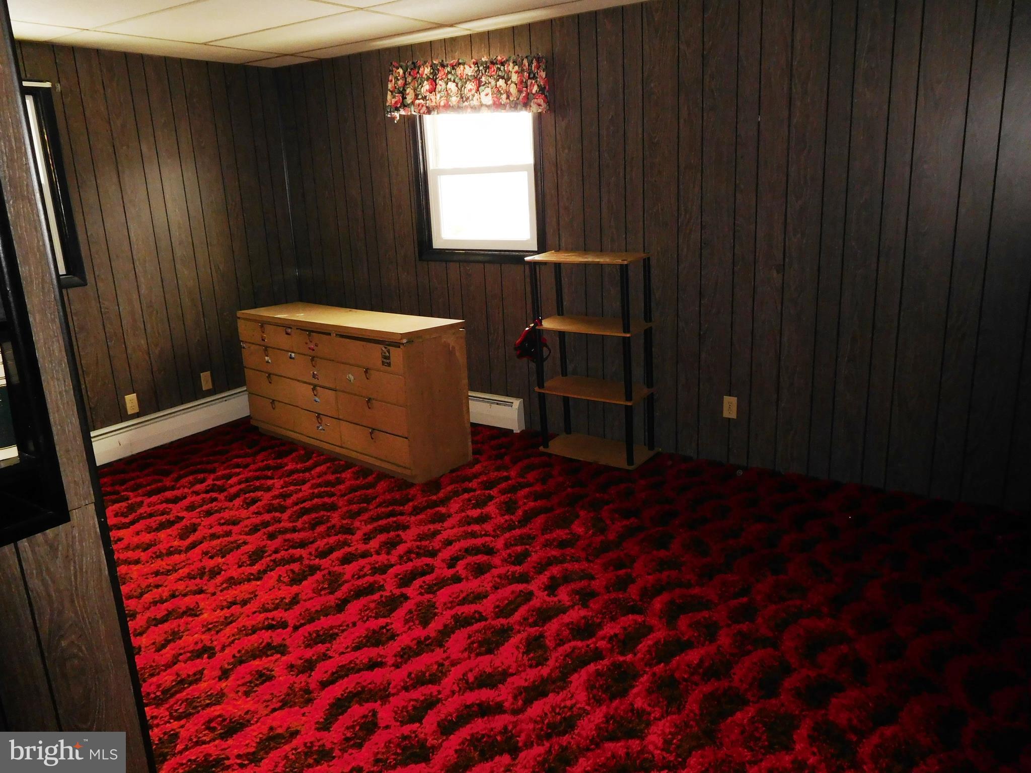 14920 Cemetery Road Midland, MD 21532 - Photo 10 of 26 a room with a window and a mirror