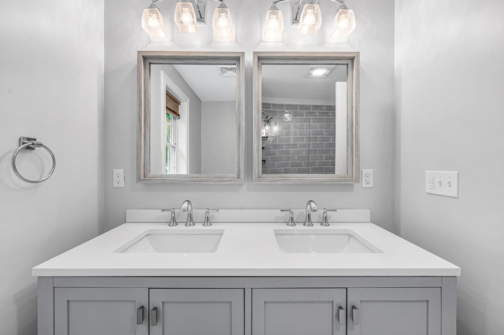 1310 North Brookfield Road Oakham, MA 01068 - Photo 23 of 30 a bathroom with a sink and a mirror