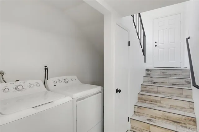 an aerial view of houses with outdoor space