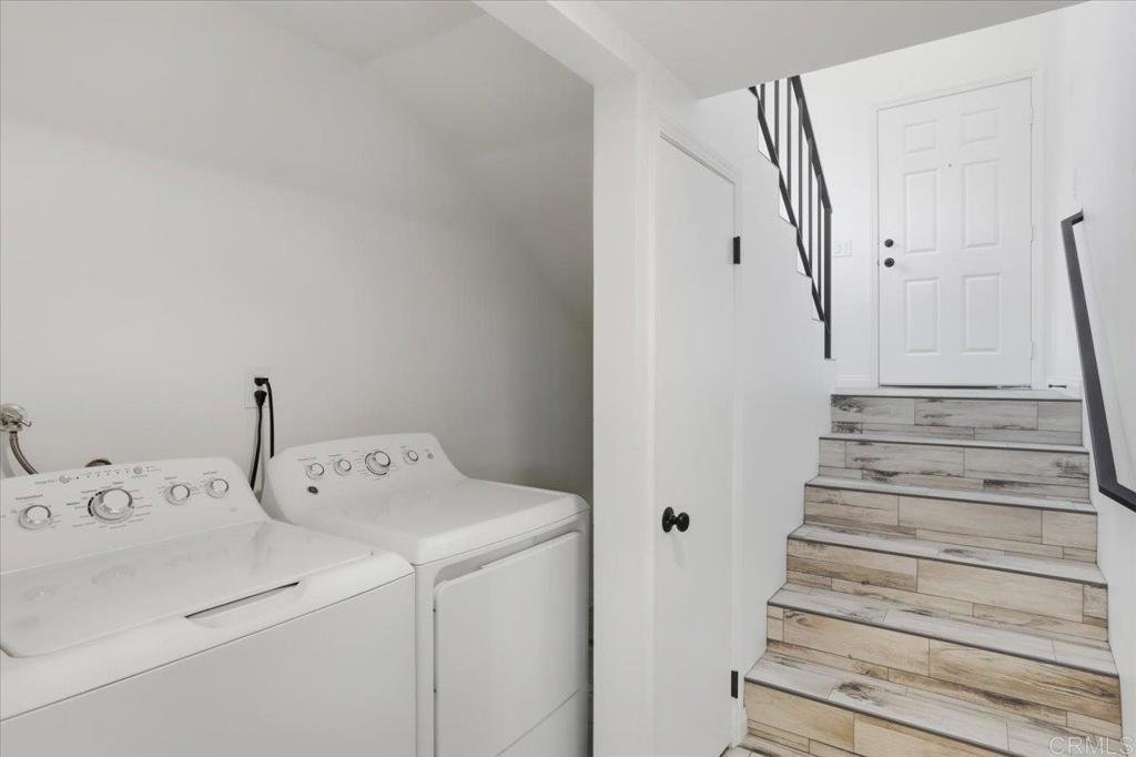 6686 Corte Maria Carlsbad, CA 92009 - Photo 24 of 28 a view of walk in closet with clothes and shoes
