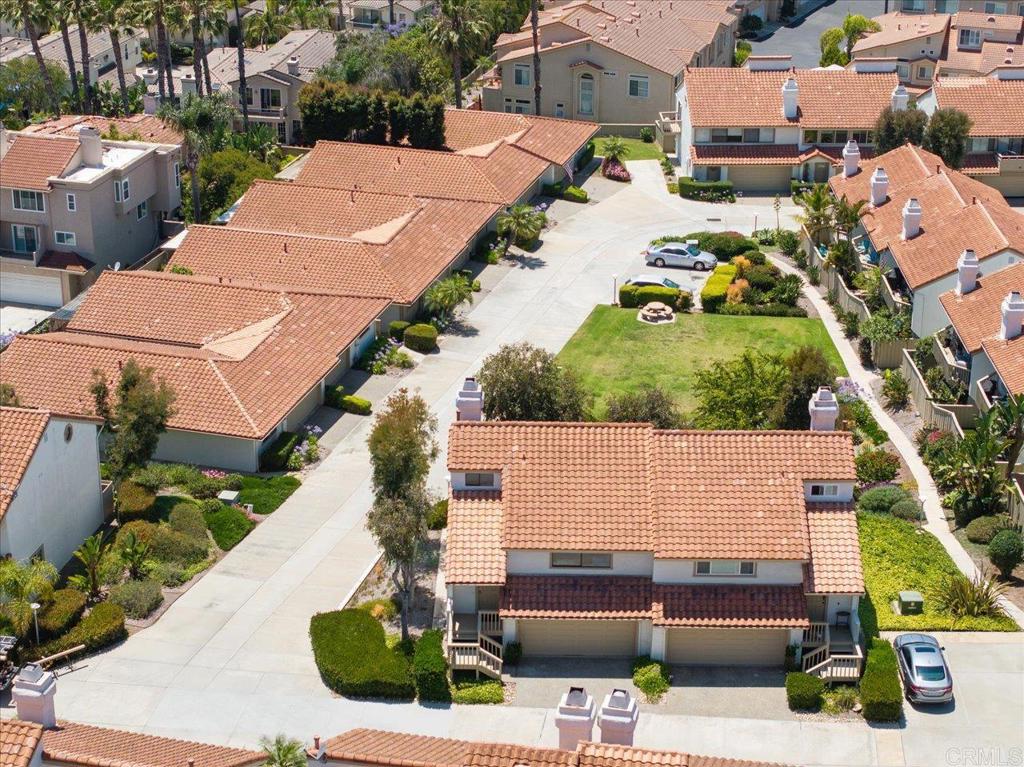 6686 Corte Maria Carlsbad, CA 92009 - Photo 4 of 28 an aerial view of a houses with yard