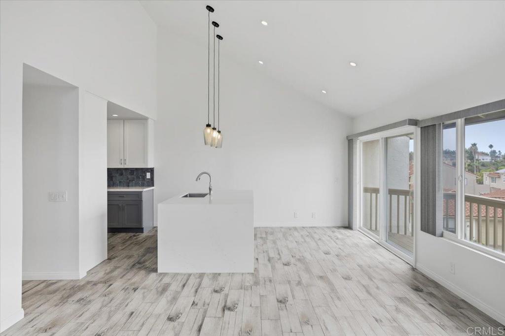 6686 Corte Maria Carlsbad, CA 92009 - Photo 9 of 28 a view of empty room with wooden floor and window