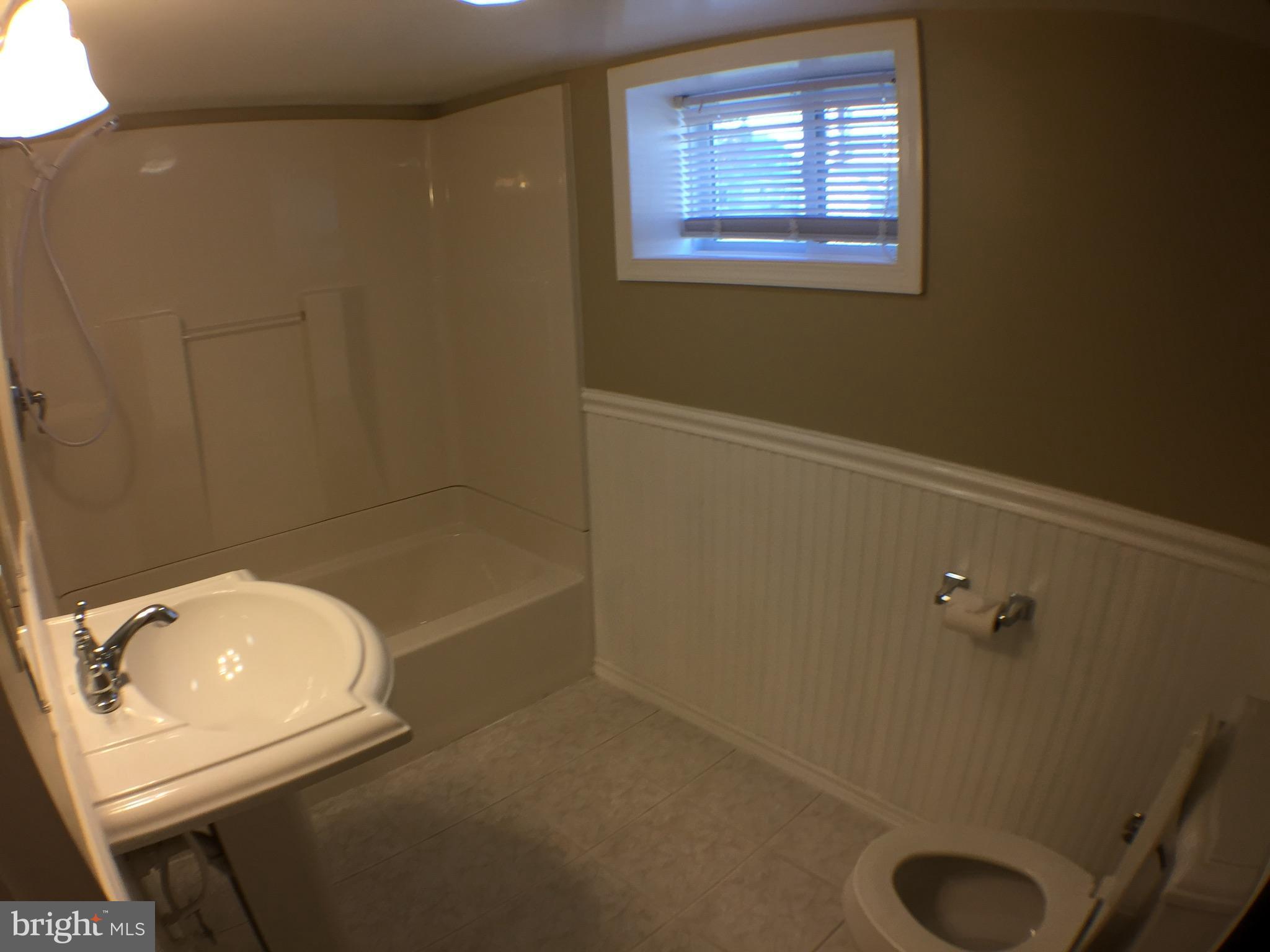 1517 Rita Road Baltimore, MD 21222 - Photo 12 of 12 a bathroom with a tub