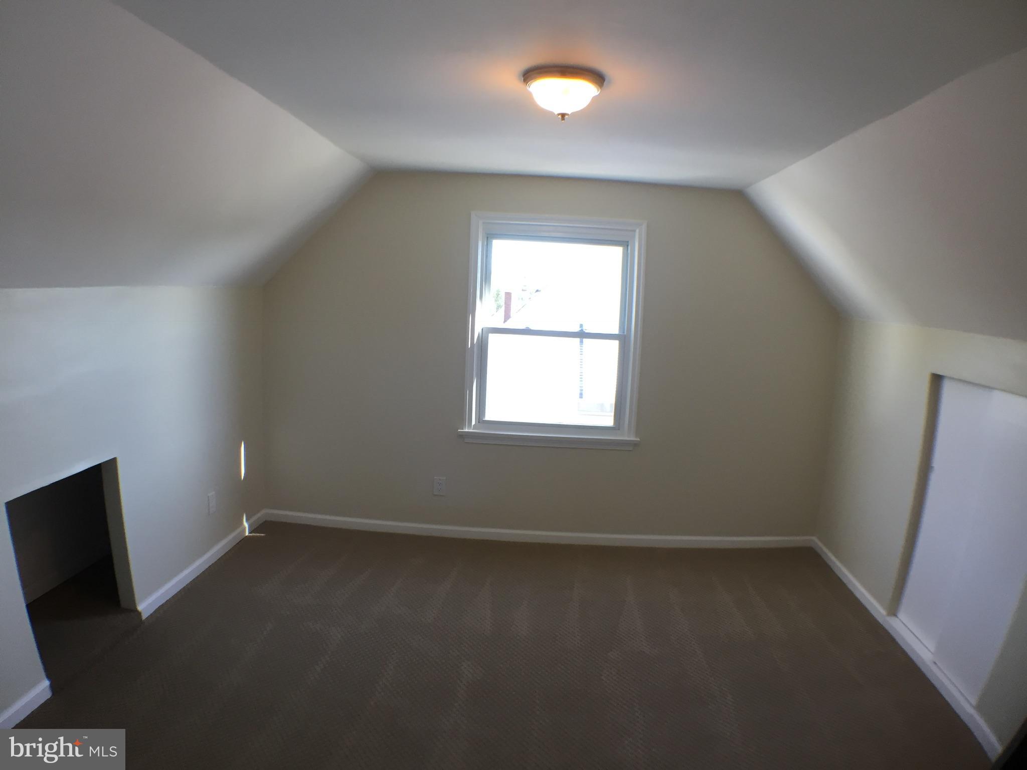 1517 Rita Road Baltimore, MD 21222 - Photo 10 of 12 an empty room with a window