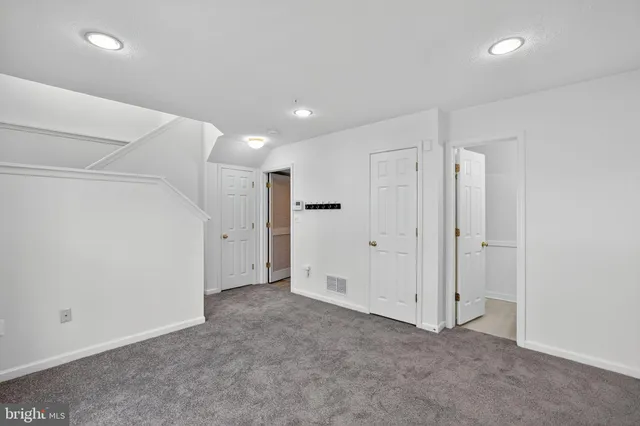 a view of storage and utility room with washer and dryer