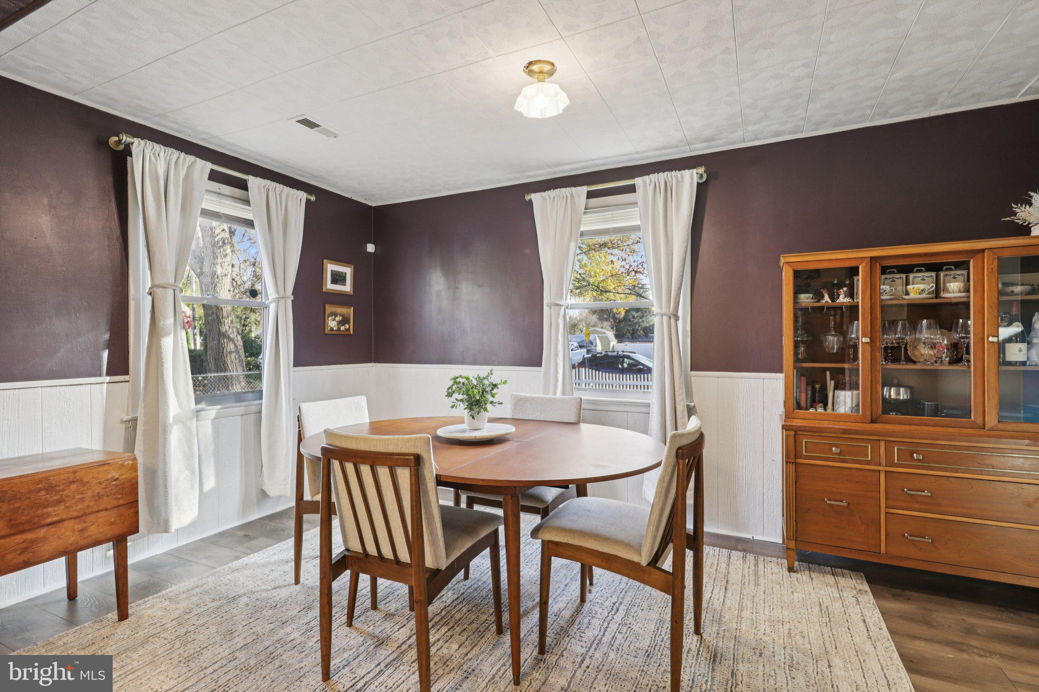 6501 Sligo Parkway Hyattsville, MD 20782 - Photo 13 of 25 a view of a dining room with furniture and window