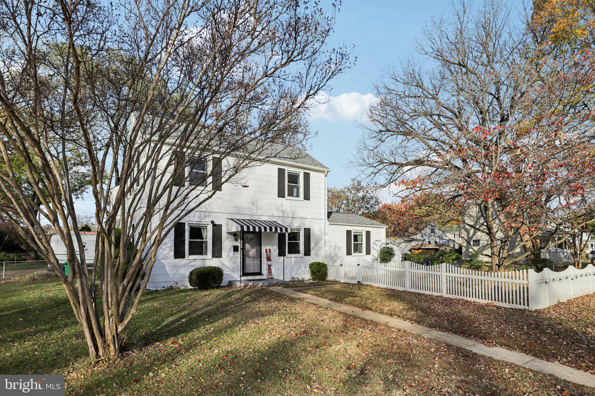 6501 Sligo Parkway Hyattsville, MD 20782 - Photo 2 of 25 a front view of a house with a yard