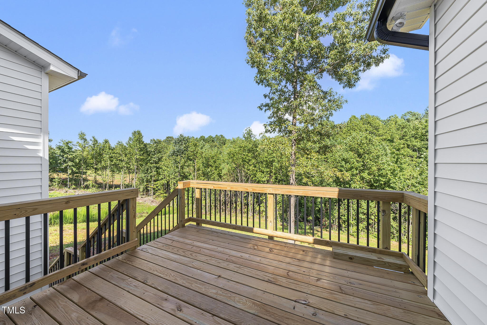 30 Morning Dew Way Spring Hope, NC 27882 - Photo 11 of 23 a view of a balcony with wooden floor