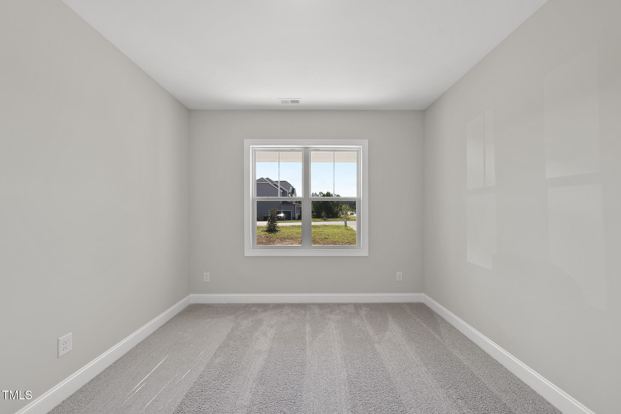 30 Morning Dew Way Spring Hope, NC 27882 - Photo 12 of 23 an empty room with a window