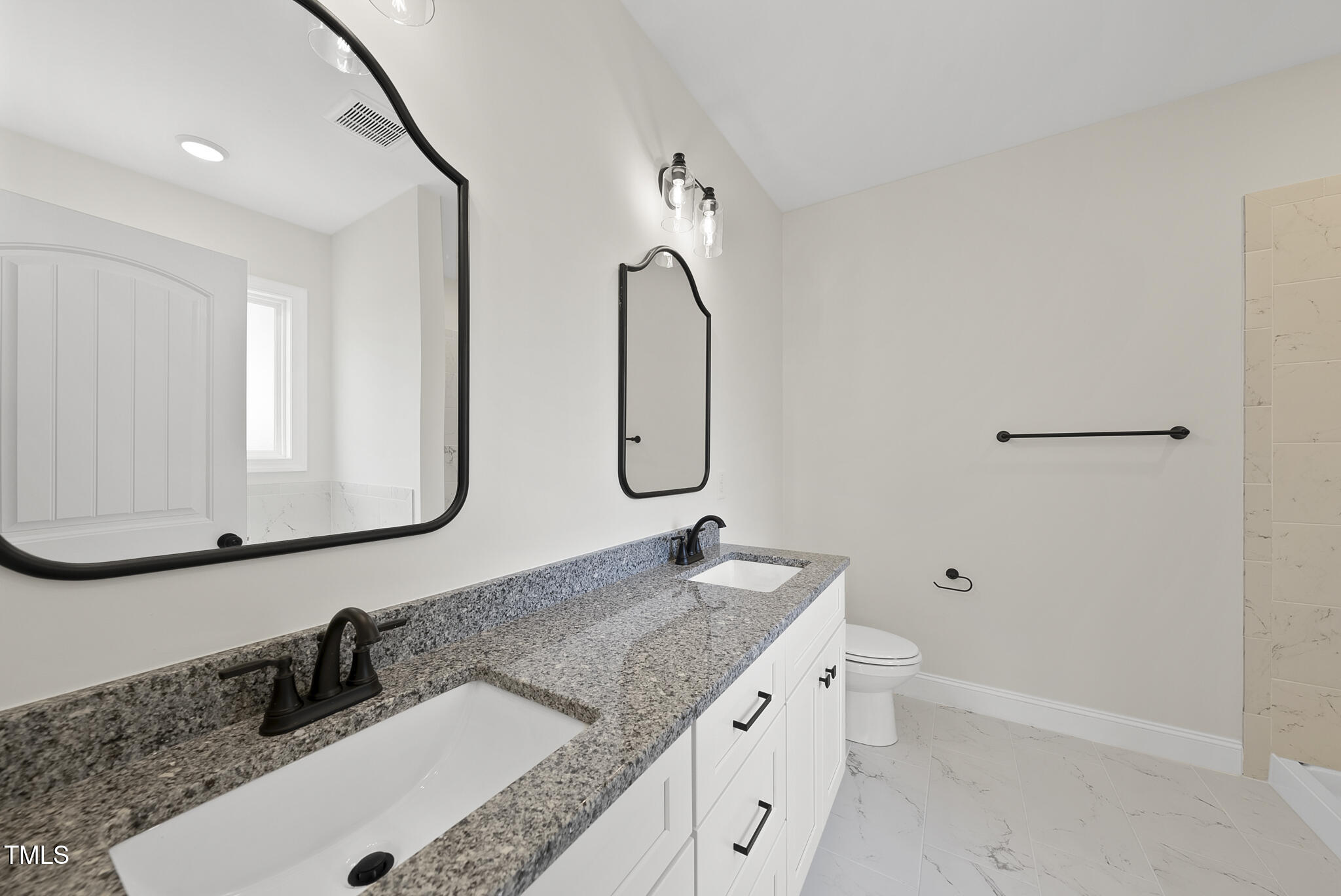 30 Morning Dew Way Spring Hope, NC 27882 - Photo 16 of 23 a bathroom with a granite countertop sink and a mirror