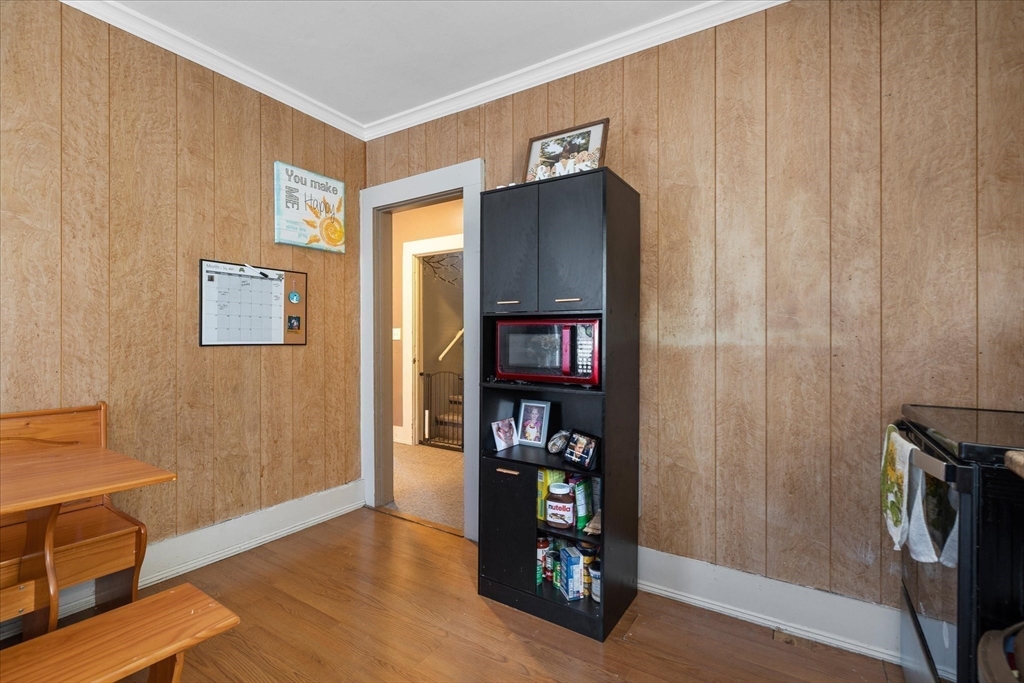 19 Schofield Avenue Dudley, MA 01571 - Photo 15 of 31 a view of an entryway with wooden floor and cabinet