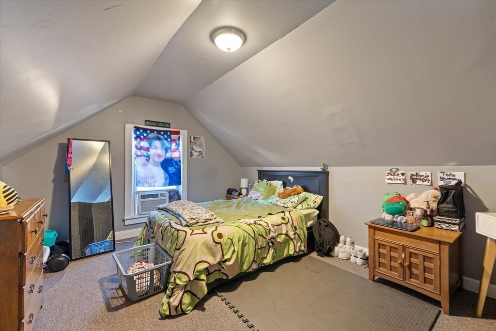 19 Schofield Avenue Dudley, MA 01571 - Photo 23 of 31 a bedroom with furniture and a bed