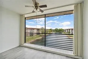 a view of a room with a large window