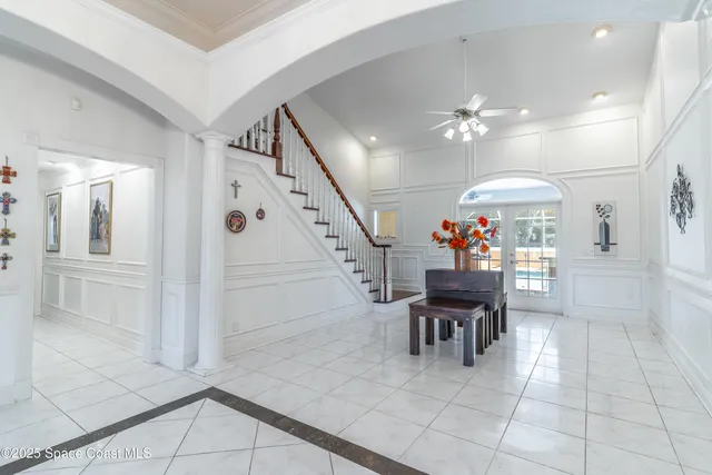 a kitchen with granite countertop a sink stove and cabinets