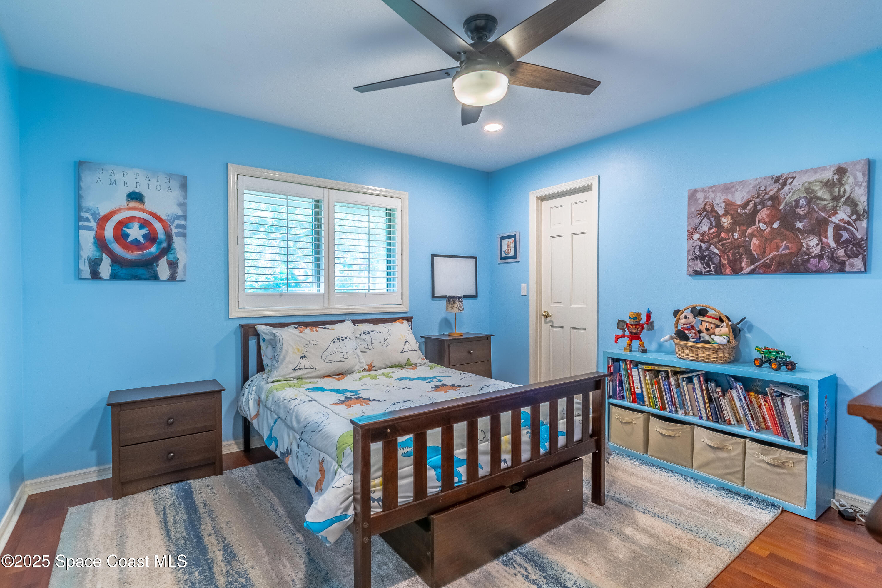 150 Utopia Circle Merritt Island, FL 32952 - Photo 37 of 52 a bedroom with furniture and a window