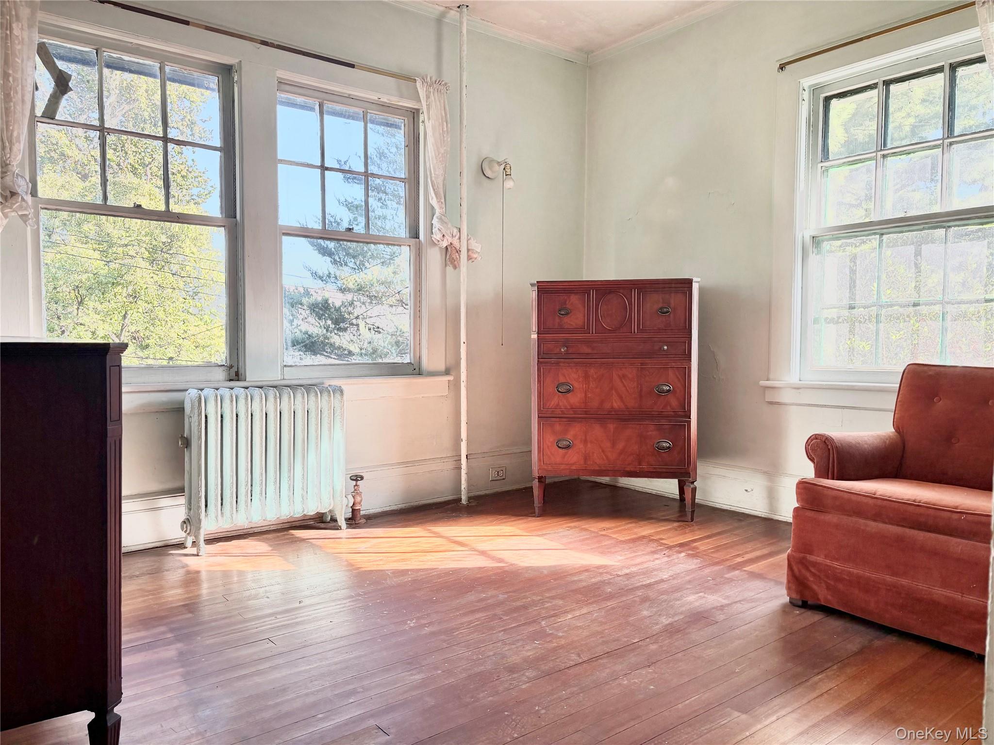236 Arleigh Road Queens, NY 11363 - Photo 8 of 25 Bedroom w/ hardwood floors, North facing