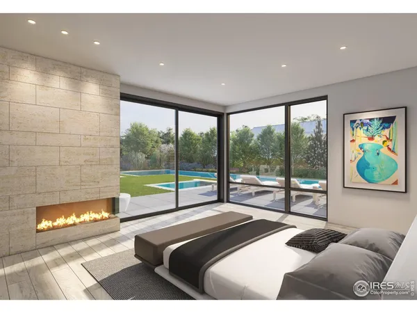 a kitchen with stainless steel appliances kitchen island granite countertop a refrigerator and a stove