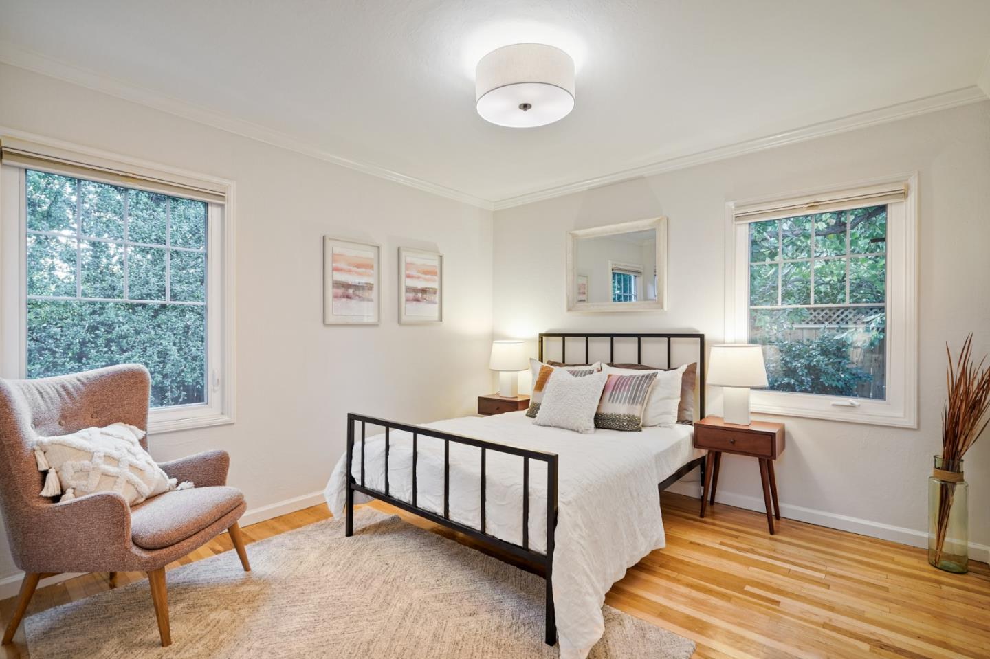 316 McKendry Drive Menlo Park, CA 94025 - Photo 13 of 21 a bedroom with a bed and wooden floor
