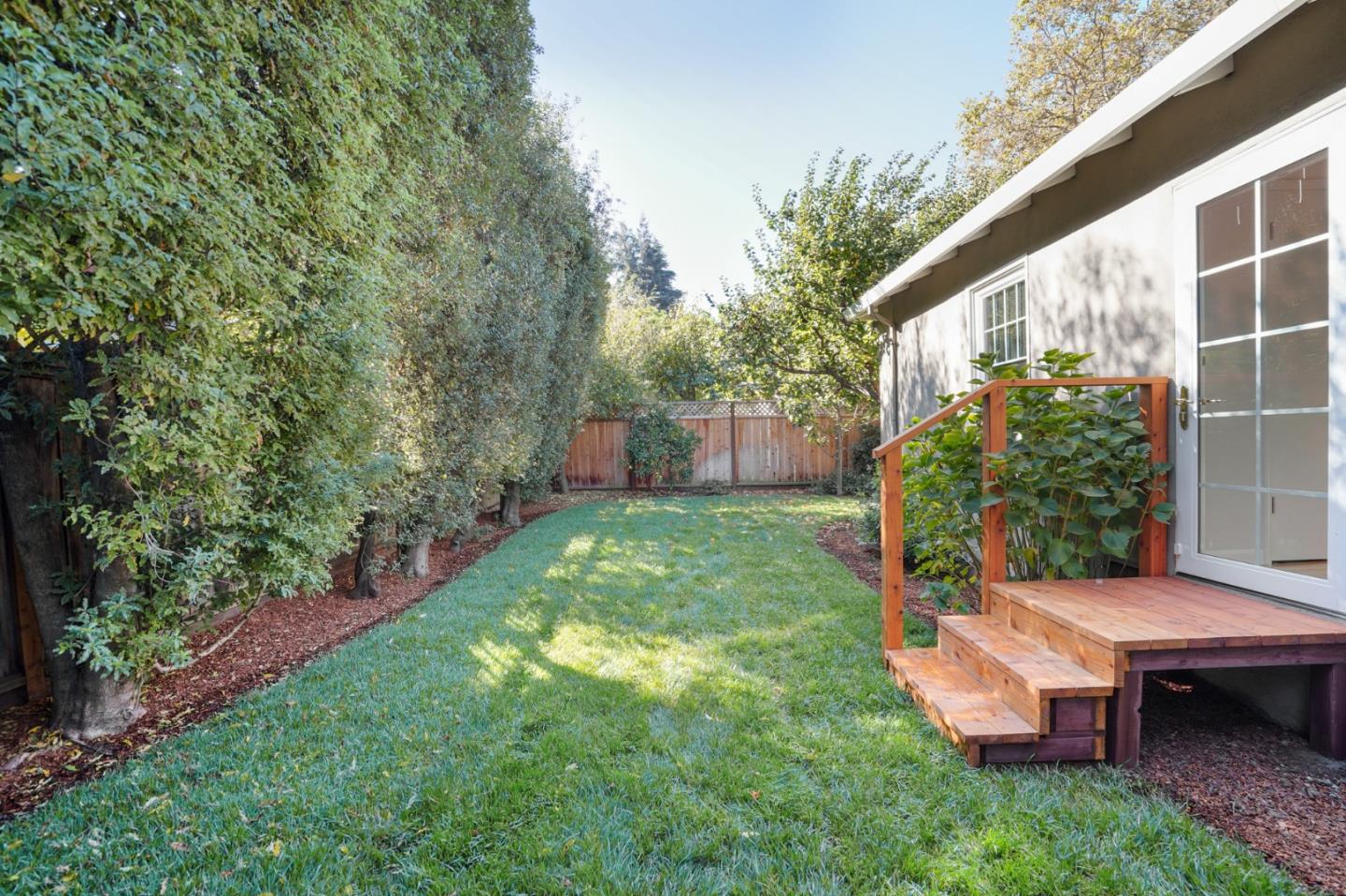 316 McKendry Drive Menlo Park, CA 94025 - Photo 20 of 21 a view of a chair and table in backyard of the house
