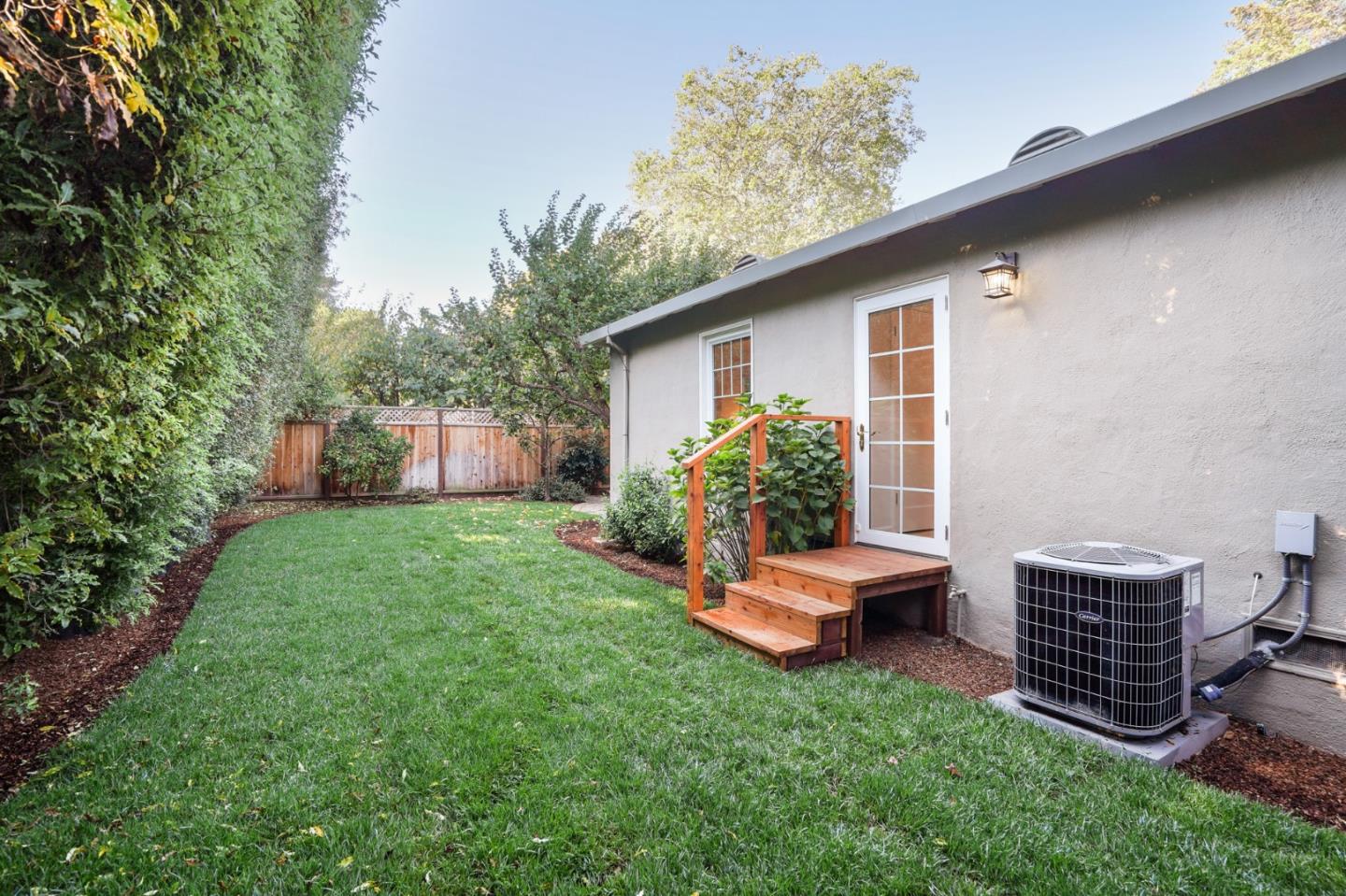 316 McKendry Drive Menlo Park, CA 94025 - Photo 21 of 21 a backyard of a house with seating space