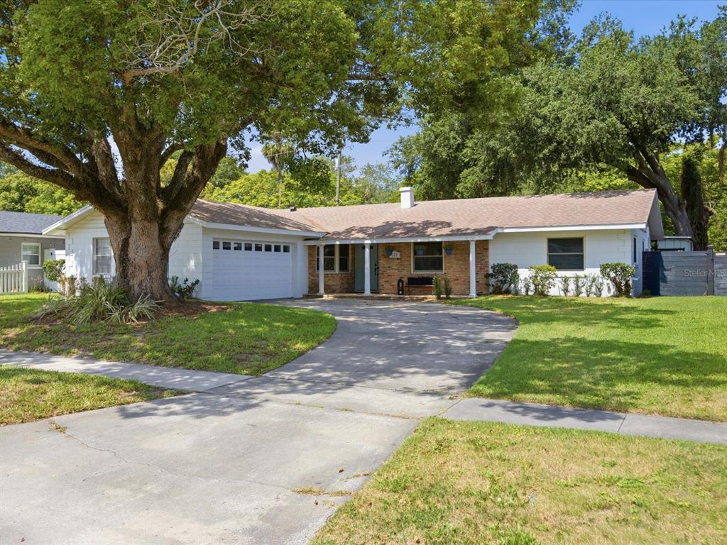333 Cornwall Road Winter Park, FL 32792 - Photo 1 of 32 front view of a house with a yard
