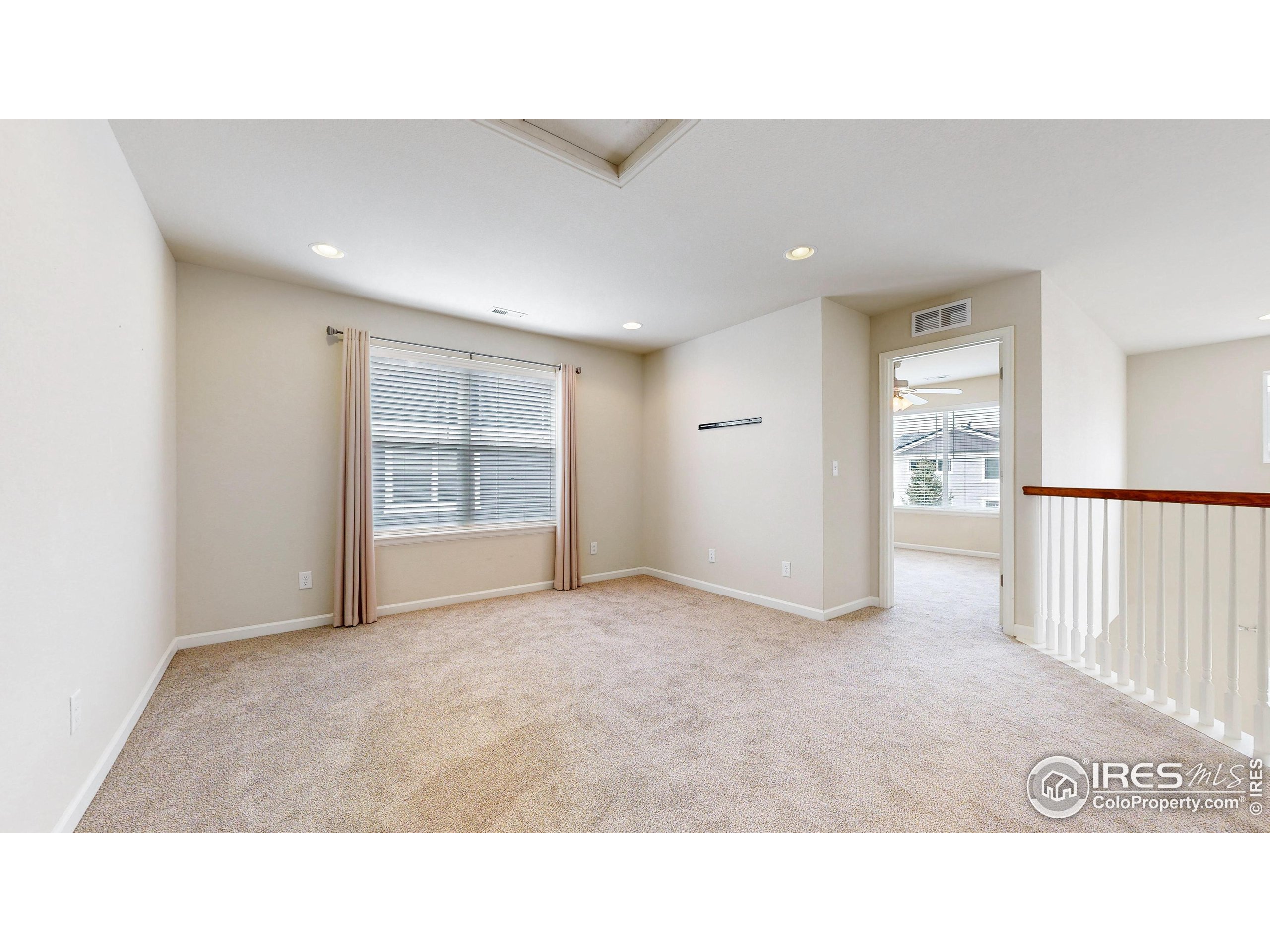 6748 Rainier Road Timnath, CO 80547 - Photo 19 of 34 a open hall with a window