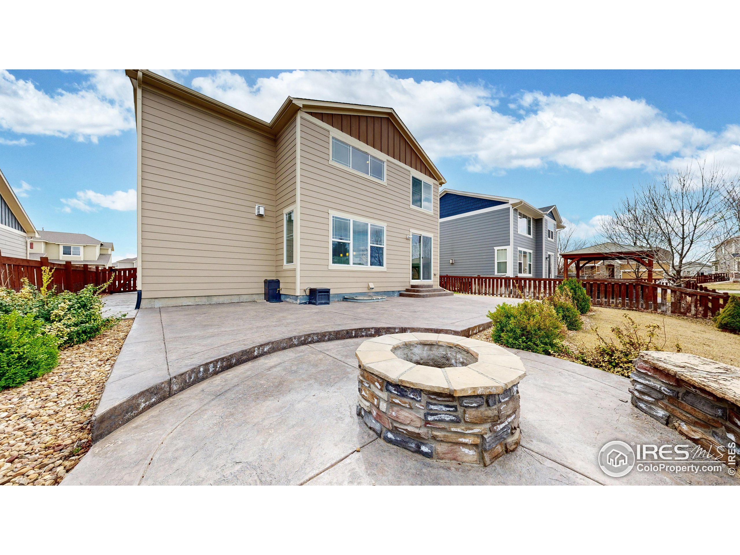 6748 Rainier Road Timnath, CO 80547 - Photo 28 of 34 a outdoor space with a couch and chairs