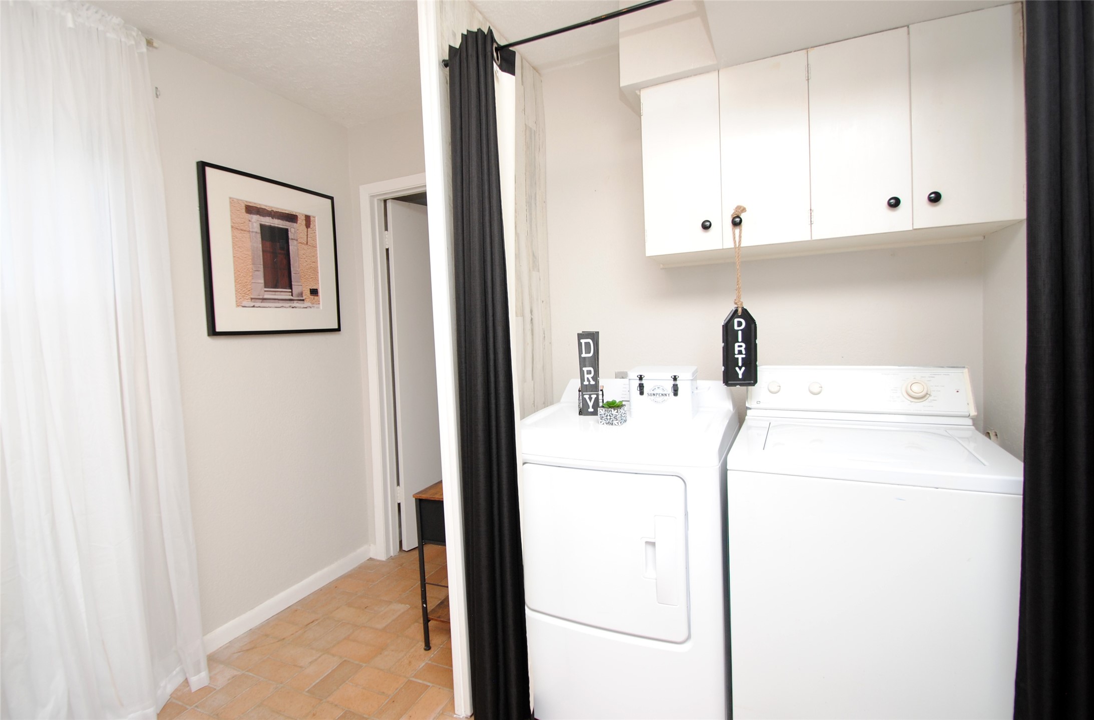 59 Paradise Loop Point Blank, TX 77364 - Photo 23 of 41 The laundry room is located just off of the game room downstairs.
